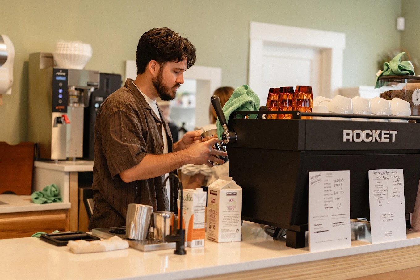Selah barista steaming milk at the Rocket espresso machine