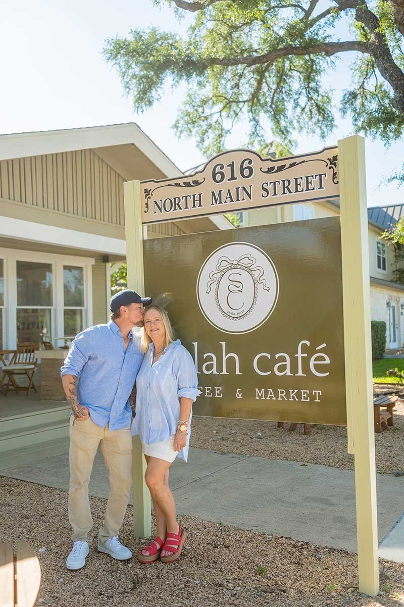 Stephen and D'Ann Gimenez by the Selah Café sign on North Main Street